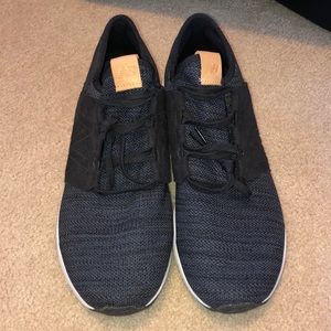 Black New Balance sneakers